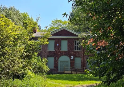 This photo is of Rock Hall in Moses Gate Country Park.
